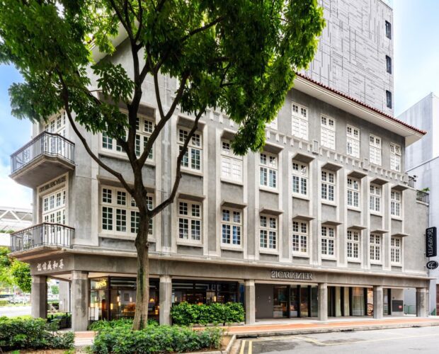 exterior of 21 Carpenter heritage hotel in Singapore with Chinese calligraphy and upper aluminium design